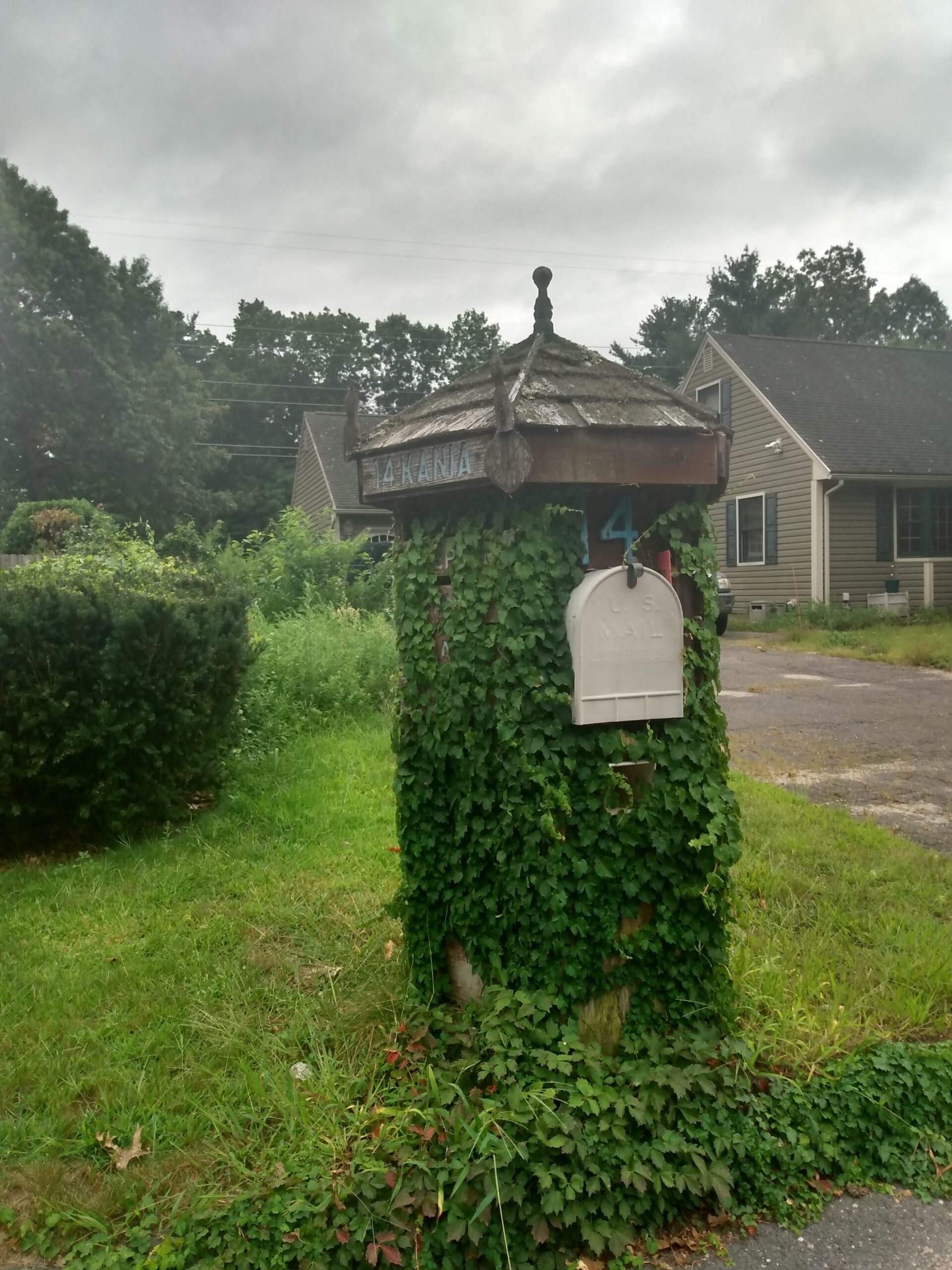 wooden mailbox tower